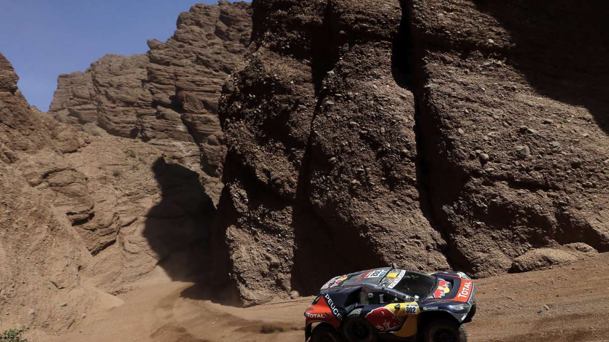 Peterhansel grabs overall lead in cars at Dakar Rally