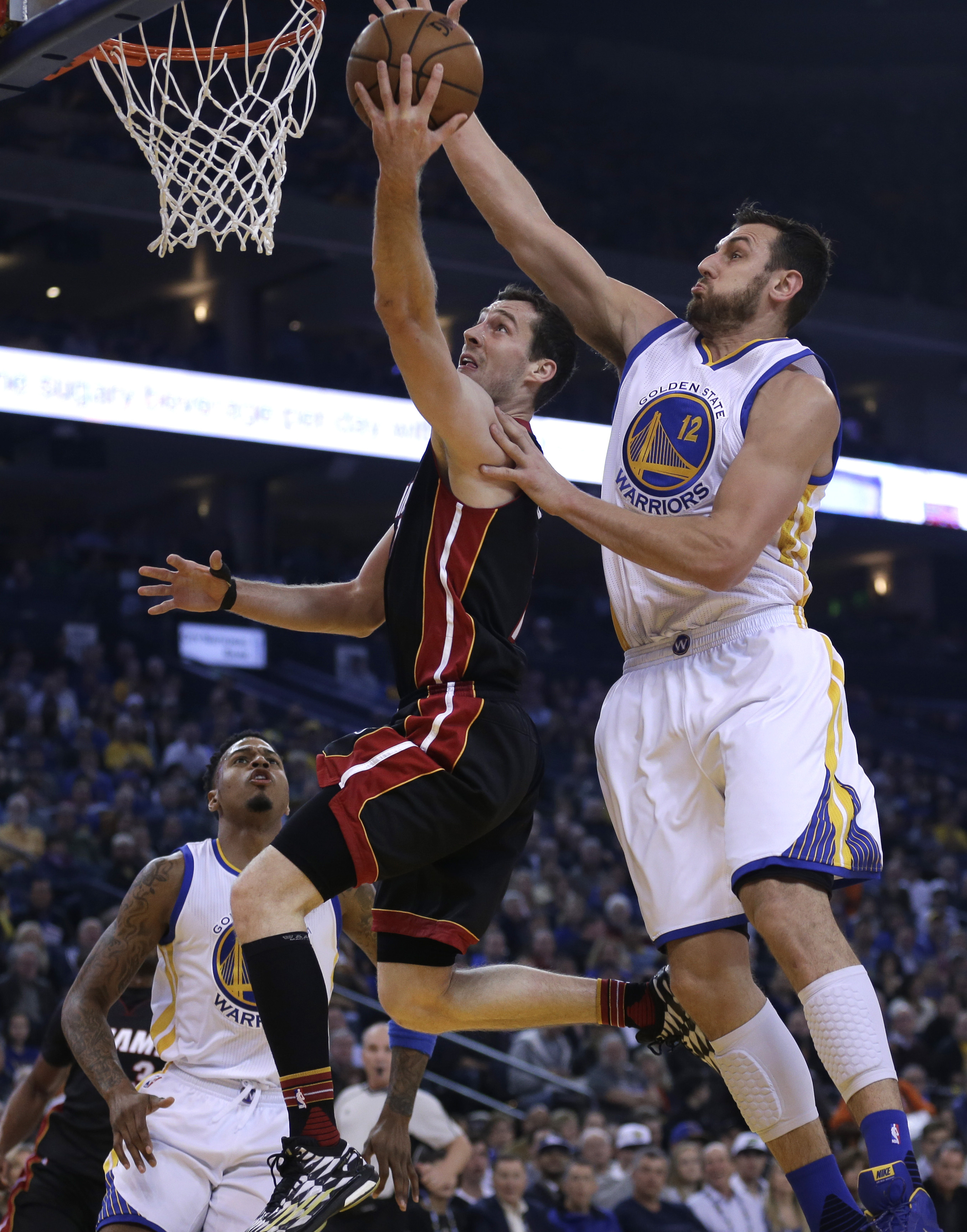 Warriors beat Heat 111-103 for 36th straight home win