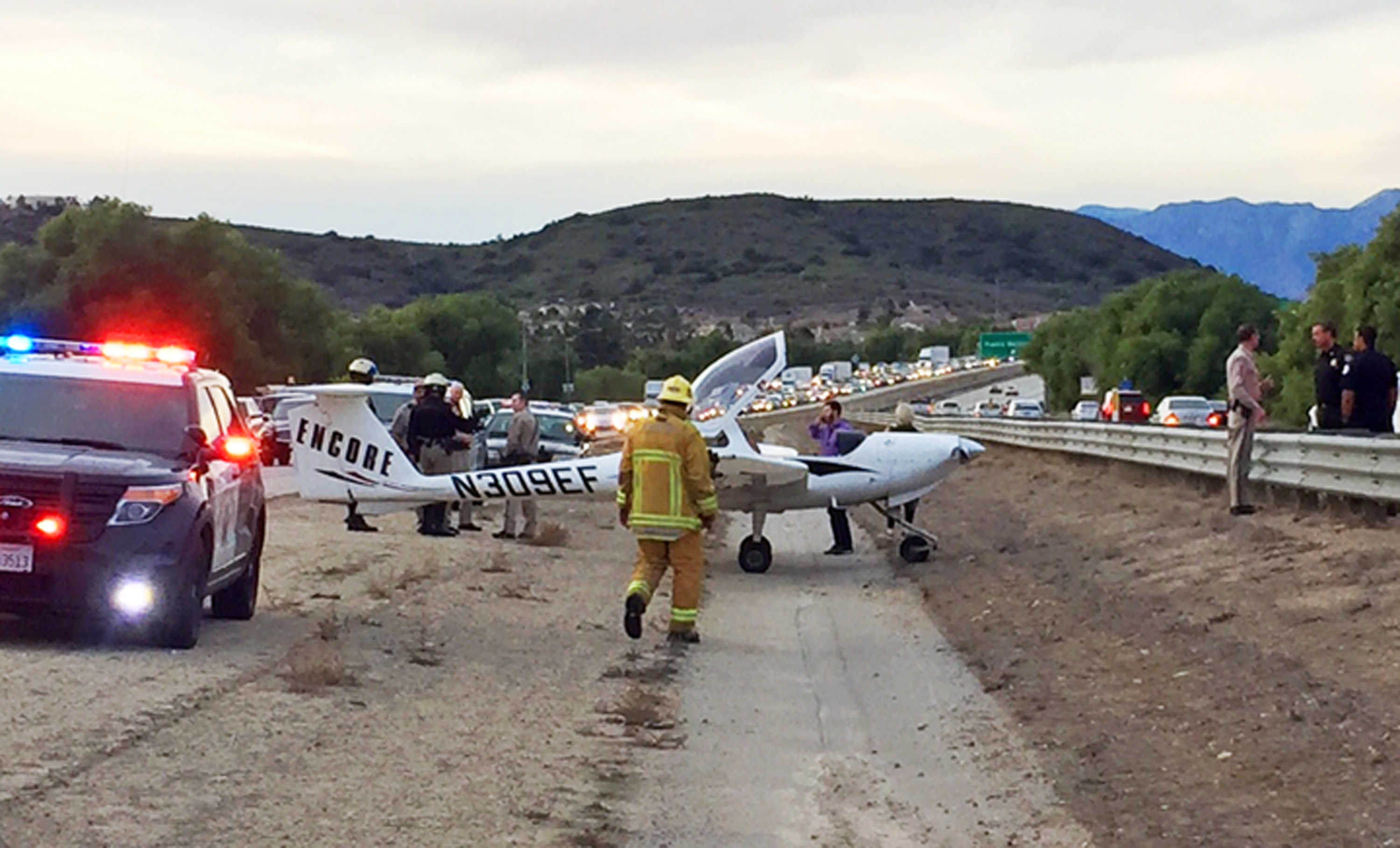 Small plane makes emergency landing on California freeway