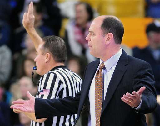Utah State head basketball coach Tim Duryea, right, reacts to a foul call during an NCAA college basketball game against San Diego State, Jan. 2, 2016, in Logan, Utah. (Photo: John Zsiray , The Herald Journal via AP)