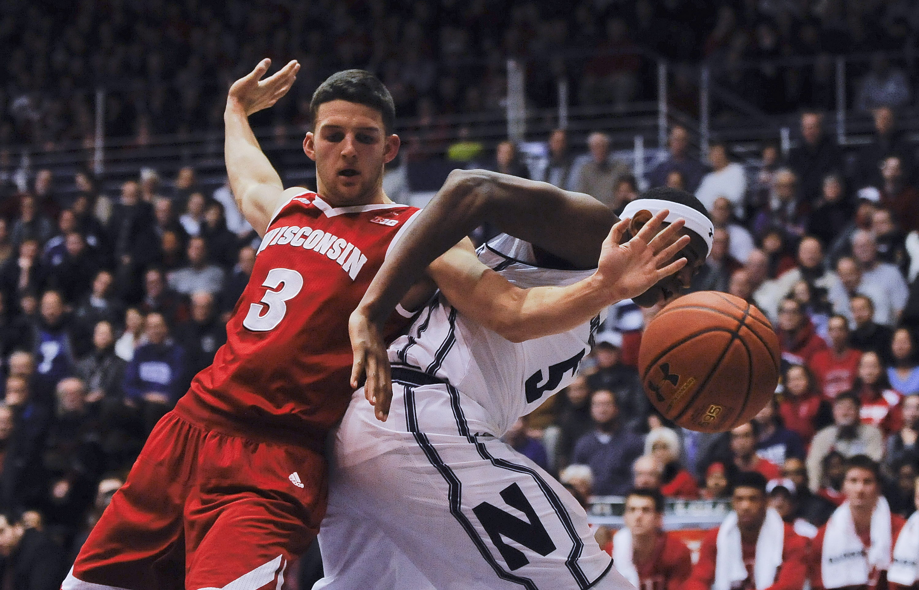 McIntosh scores 28, Northwestern beats Wisconsin 70-65