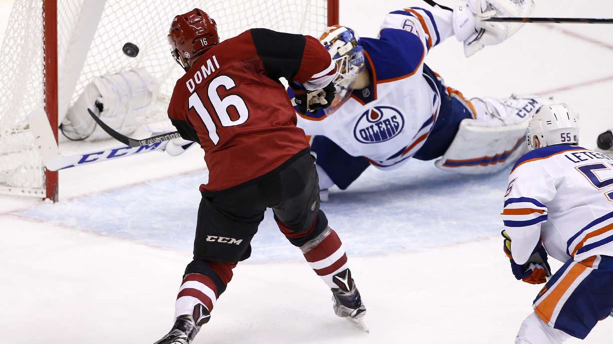 Domi, Ekman-Larrson rally Coyotes past Oilers 4-3 in OT