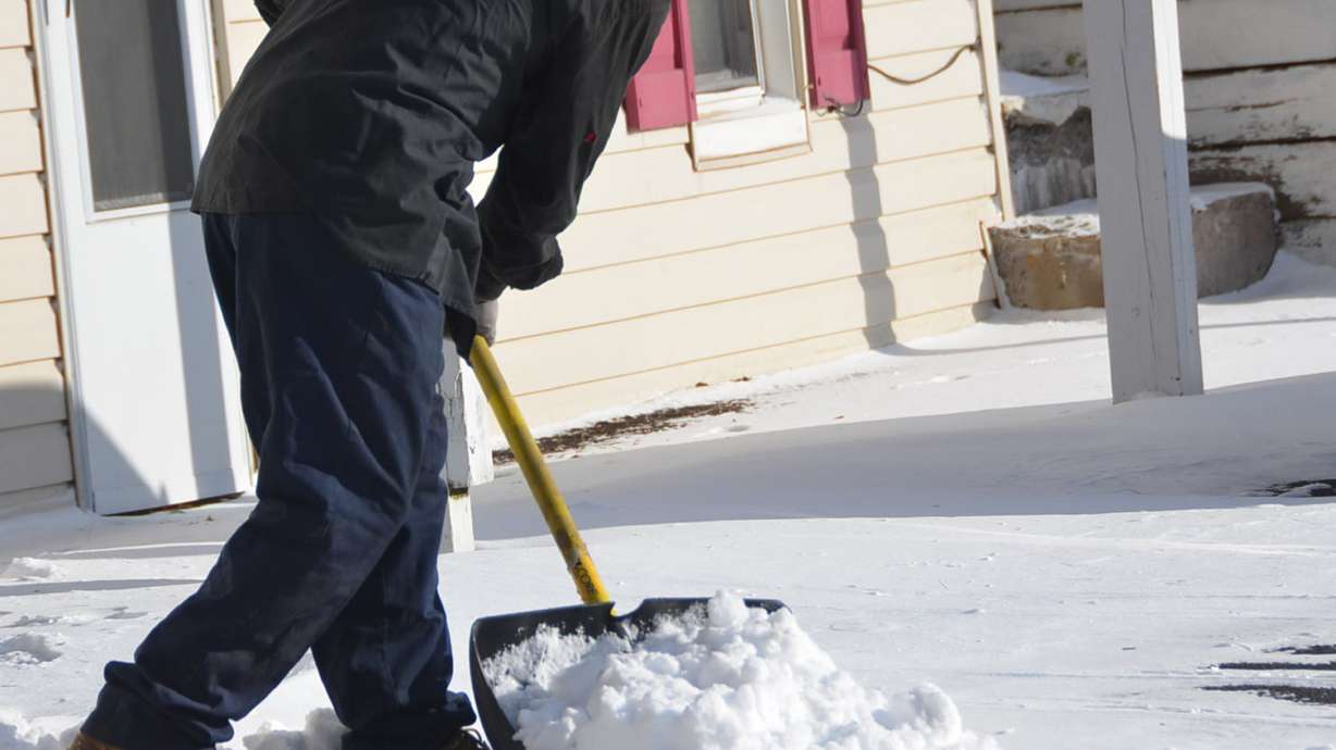 Rising snow closes schools, highways in Northeast
