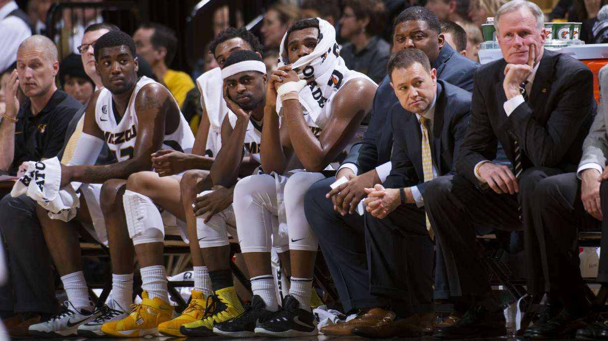 Missouri admits NCAA violations, vacates 2013-14 season
