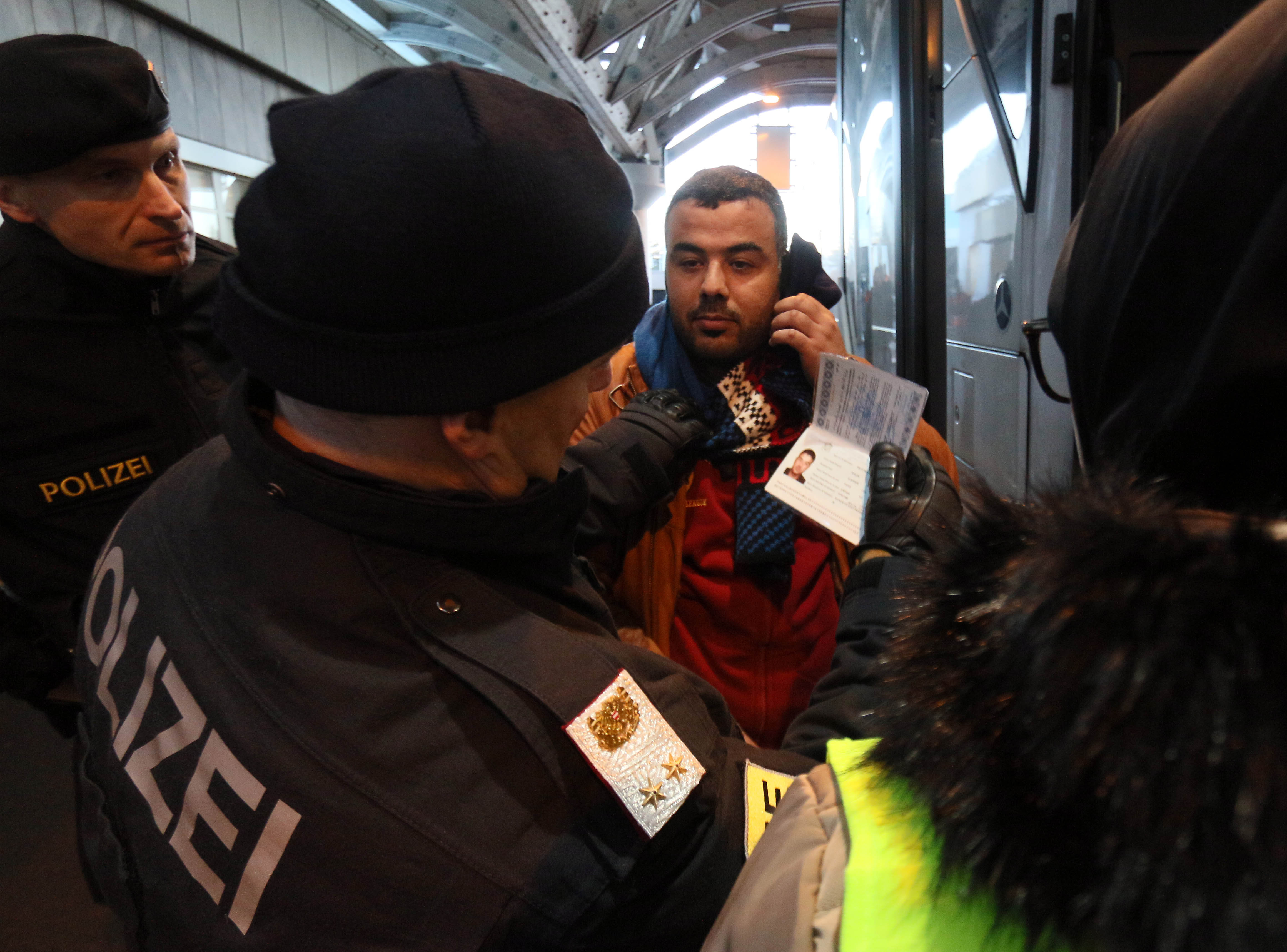 The Latest: Bavarian councilor sends refugee bus to Berlin