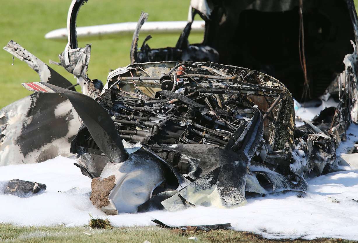 West Jordan emergency crews respond Sunday, Aug. 10, 2014, to a plane crash at the Soccer Complex, 4000 West 7965 South. A plane carrying a family of 3 from Boise, Idaho, crashed on takeoff from the South Valley Regional Airport, two people were transported by air ambulance, the third by ground ambulance. (Photo: Scott G. Winterton/Deseret News)