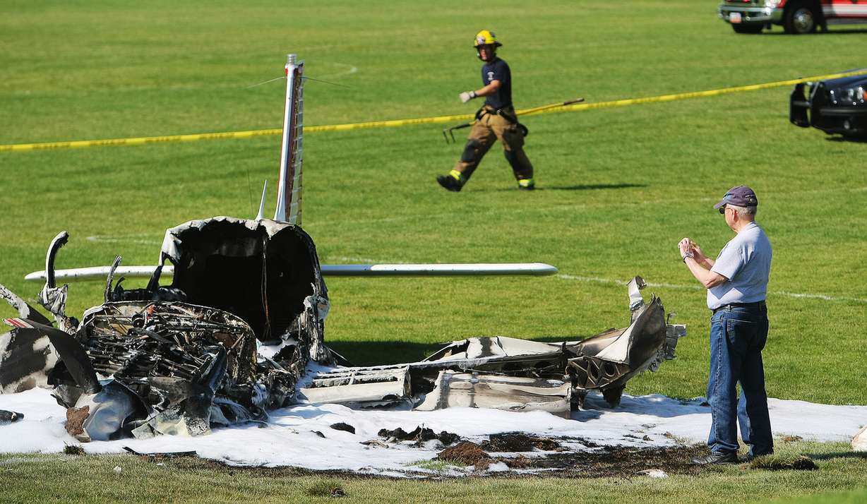 West Jordan emergency crews respond Sunday, Aug. 10, 2014, to a plane crash at the Soccer Complex, 4000 West 7965 South. A plane carrying a family of 3 from Boise, Idaho, crashed on takeoff from the South Valley Regional Airport, two people were transported by air ambulance, the third by ground ambulance. (Photo: Scott G. Winterton/Deseret News)
