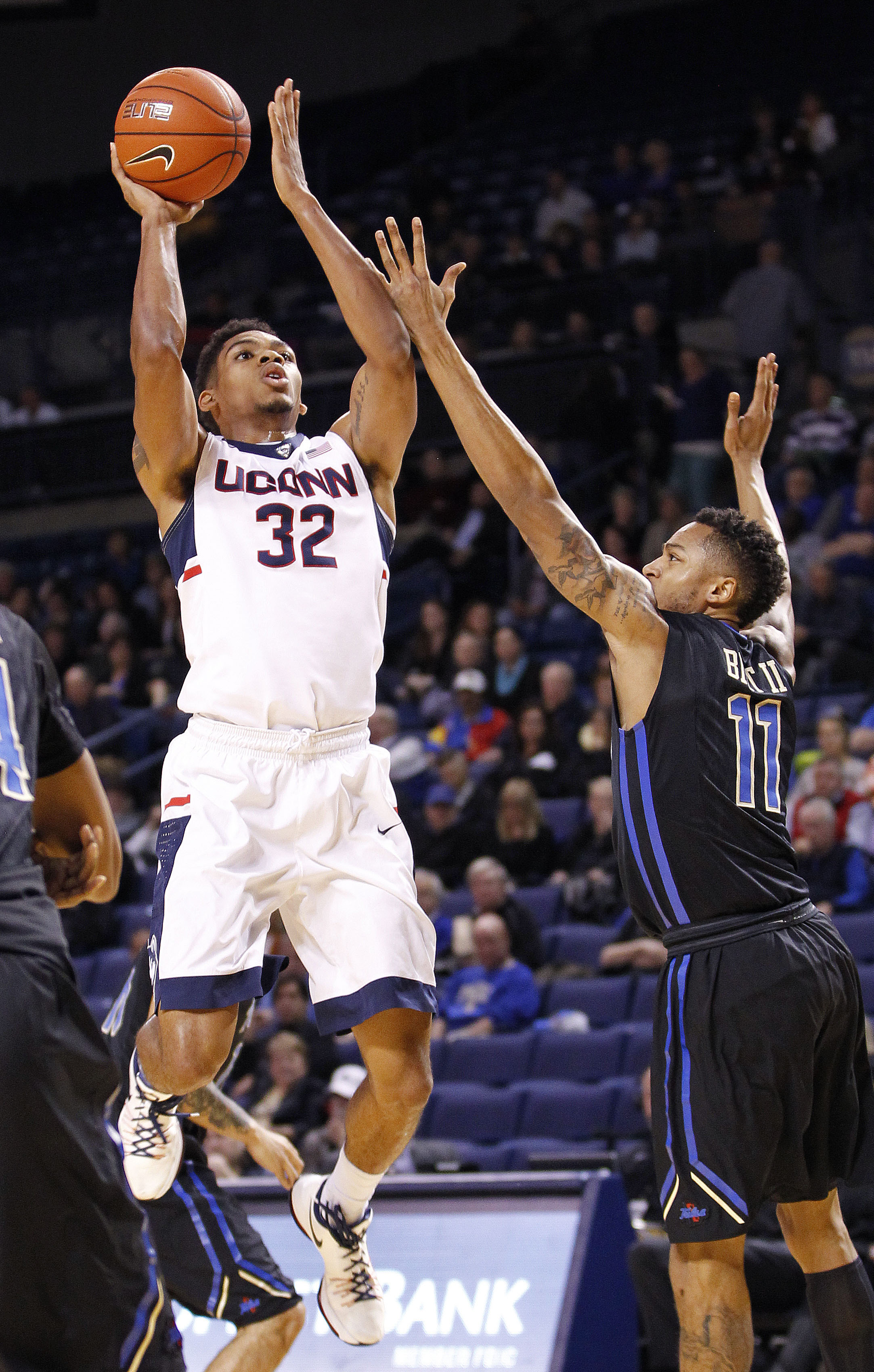 Woodard, Tulsa come from behind to take down UConn 60-51