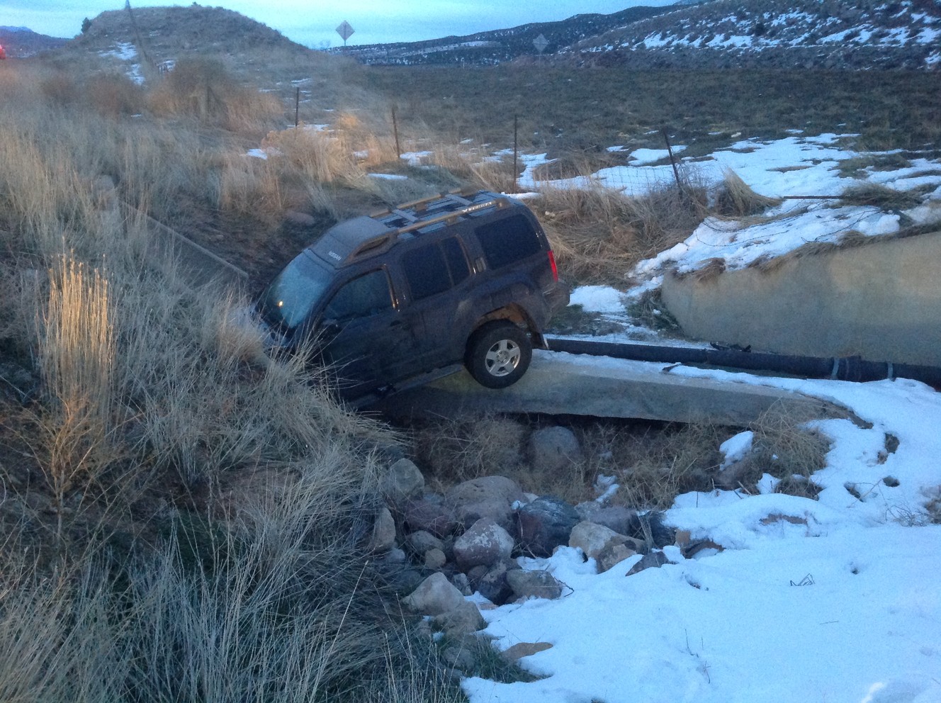 Man crashes stolen SUV into concrete tunnel during pursuit, police say