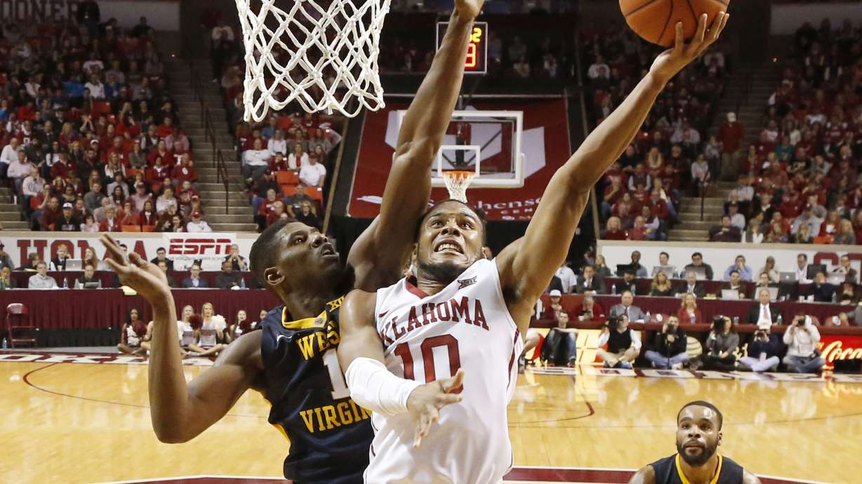 Lattin's tip lifts No. 2 Oklahoma past No. 11 W. Virginia