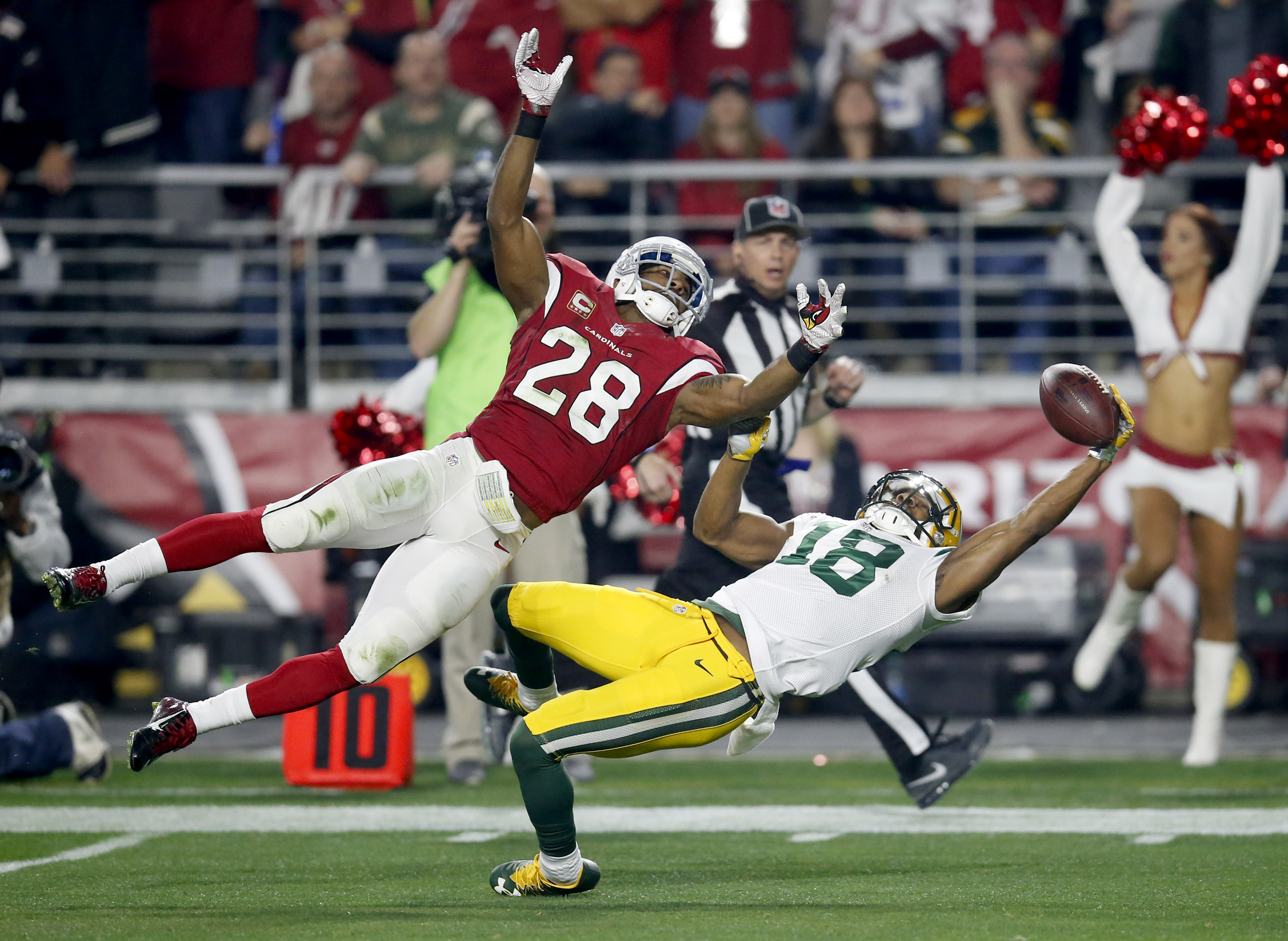 Green Bay leading receiver Cobb goes out with chest injury