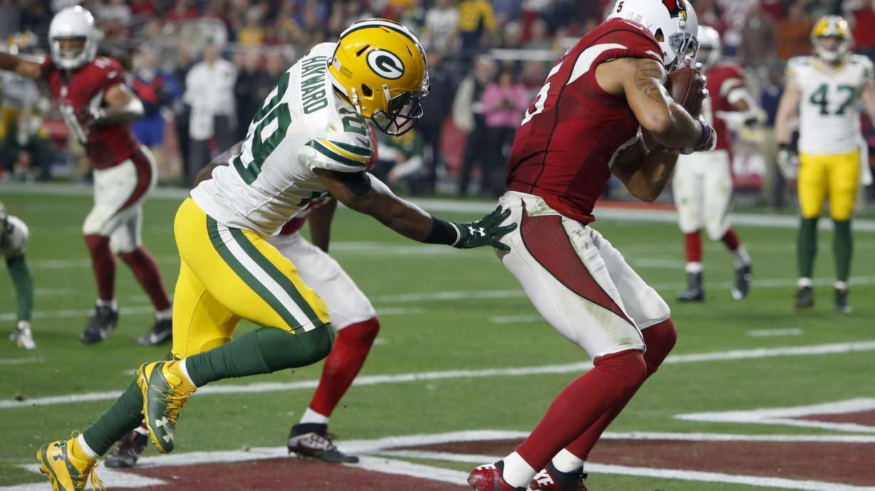 Cardinals' "Hail Larry" trumps Rodgers' Hail Mary