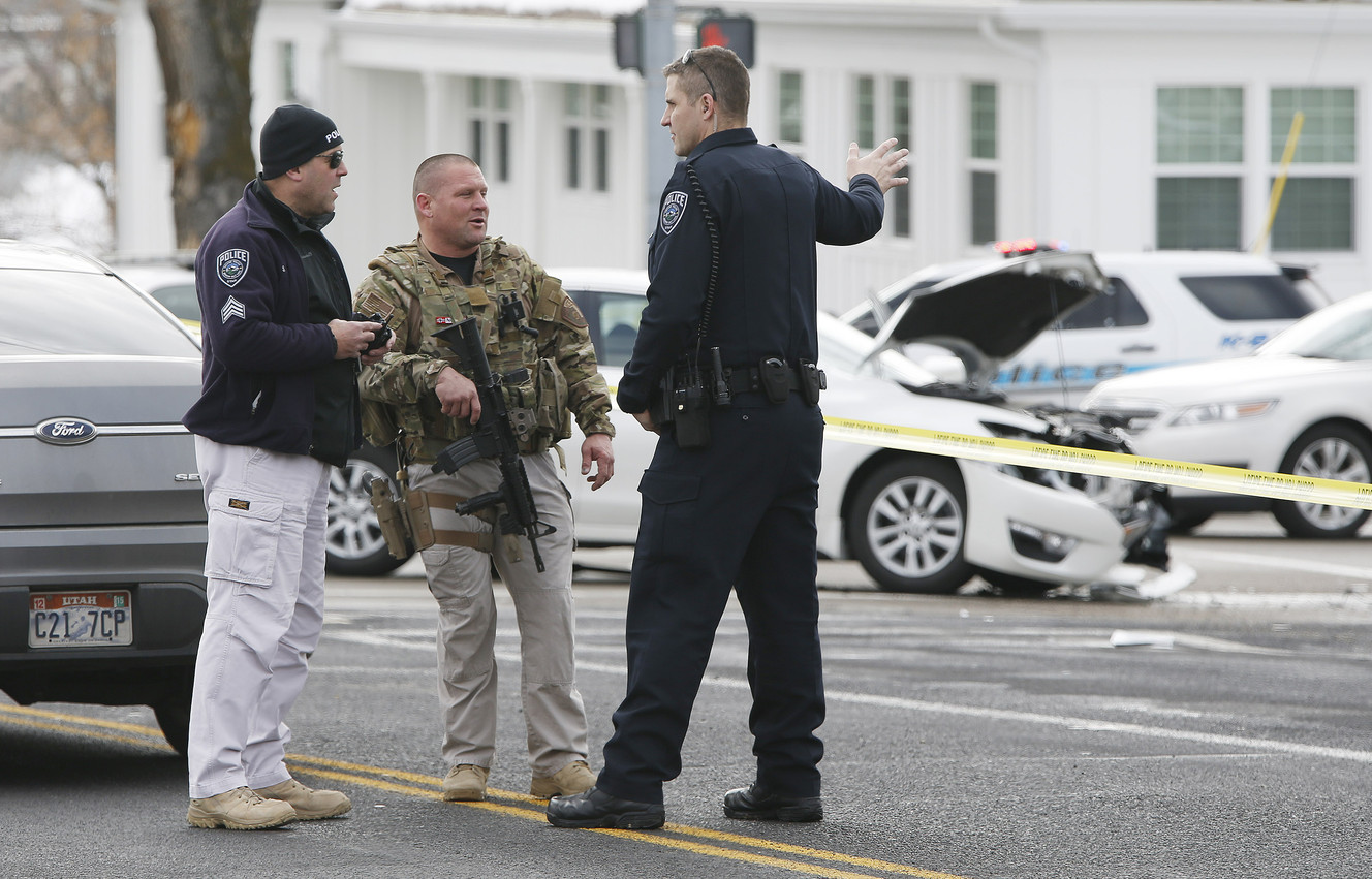 Police search for a woman connect with an officer-involved shooting on 4500 South near 2300 East in Holladay Sunday, Jan. 17, 2016. One man was shot and killed and two officers were also shot. (Photo: Jeffrey D. Allred, Deseret News)