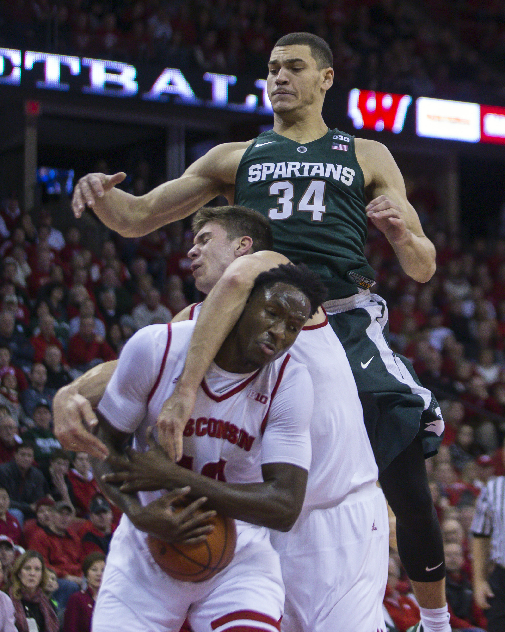 Wisconsin beats No. 4 Michigan State 77-76