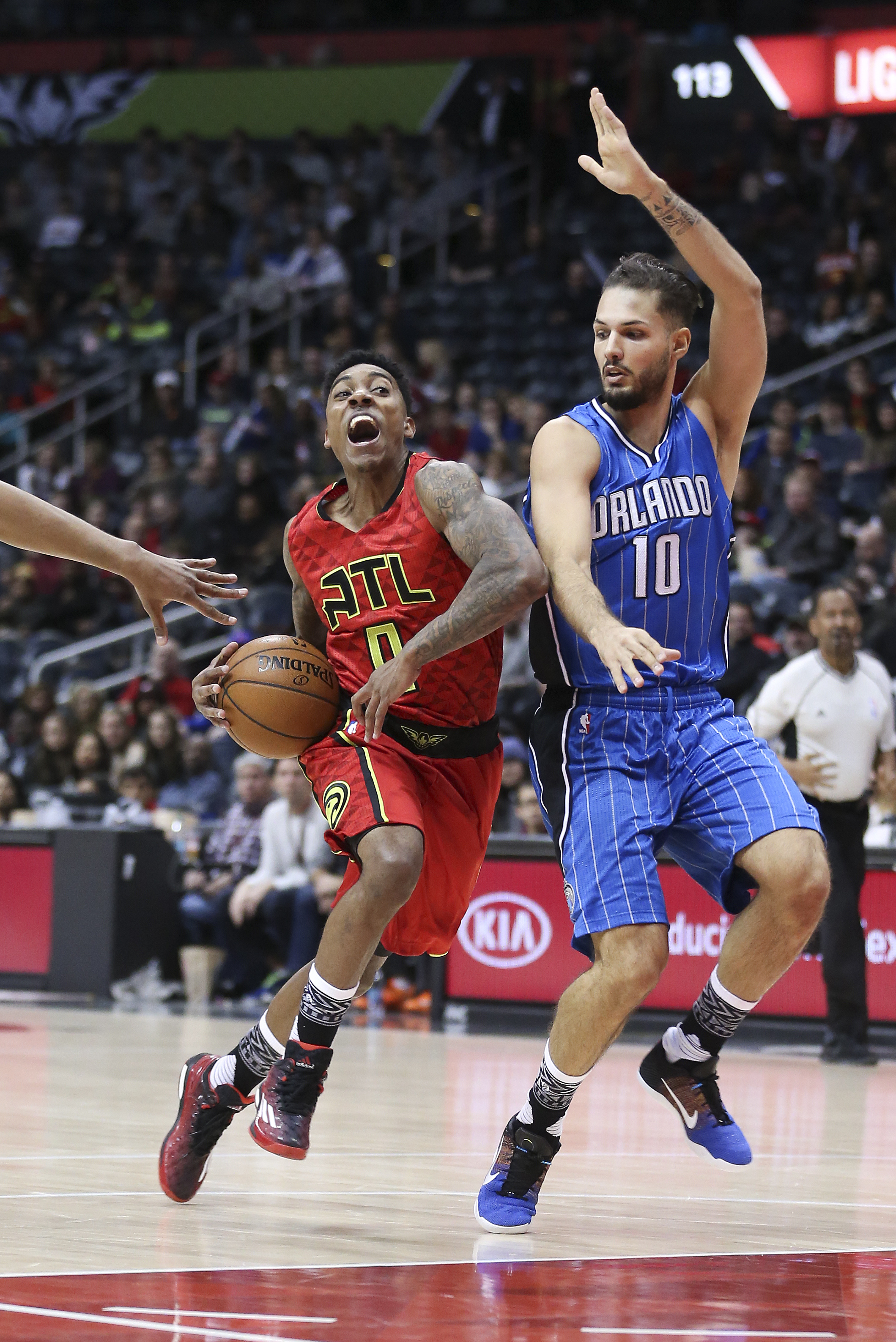 Horford, Millsap pace Hawks to easy win over Magic