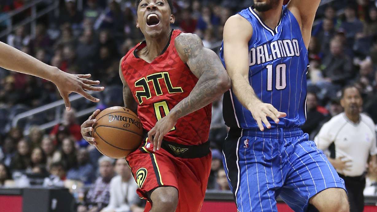 Horford, Millsap pace Hawks to easy win over Magic
