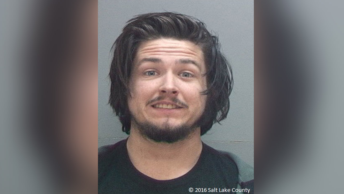 Man arrested after allegedly shooting gun out of car while driving