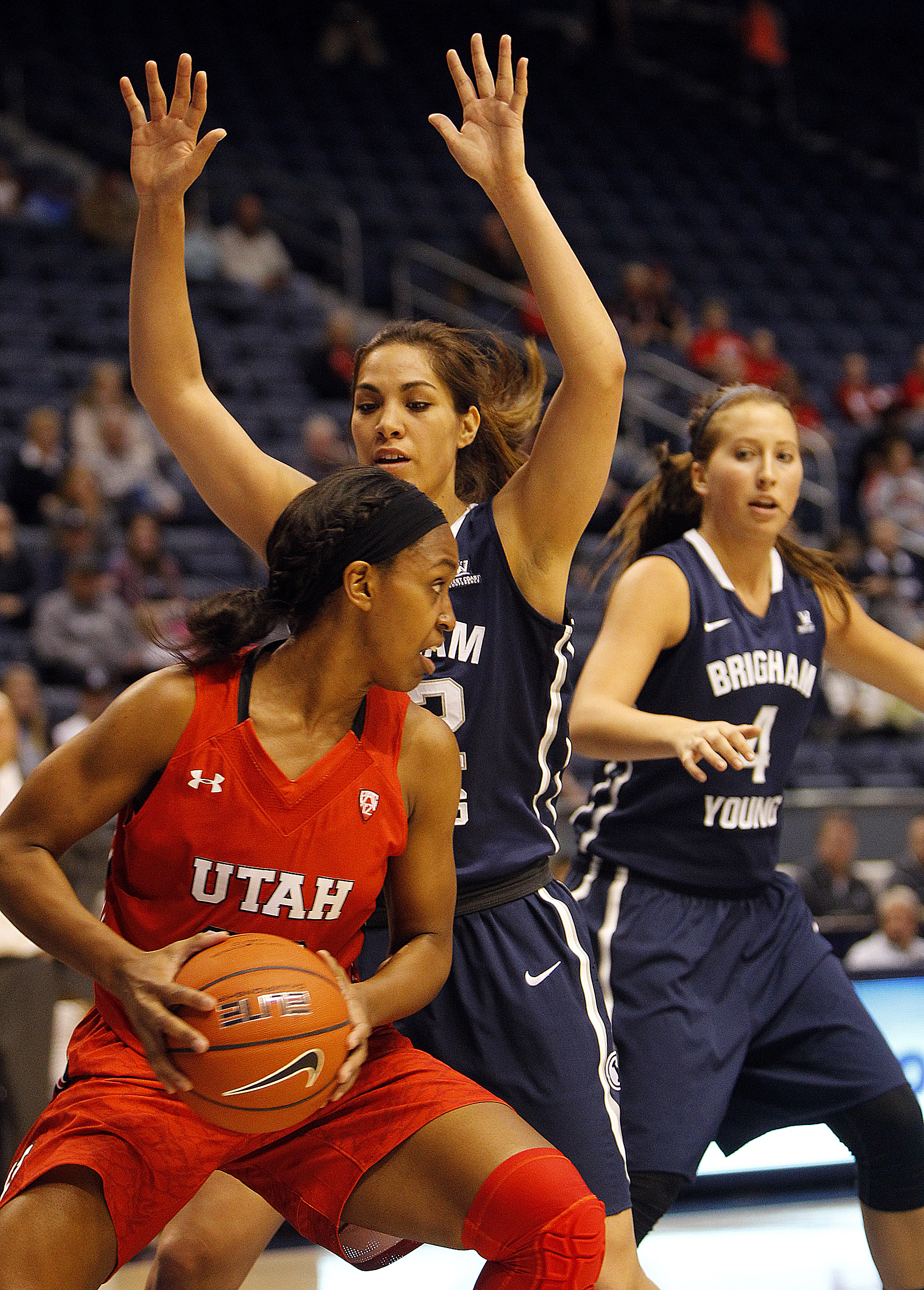 Utah forward Tanaeya Boclair, left, is guarded by BYU's Kalani Purcell and Amanda Wayment in an NCAA women's basketball game against the BYU Cougars at the Marriott Center in Provo. (Photo: Chris Samuels, Deseret News)