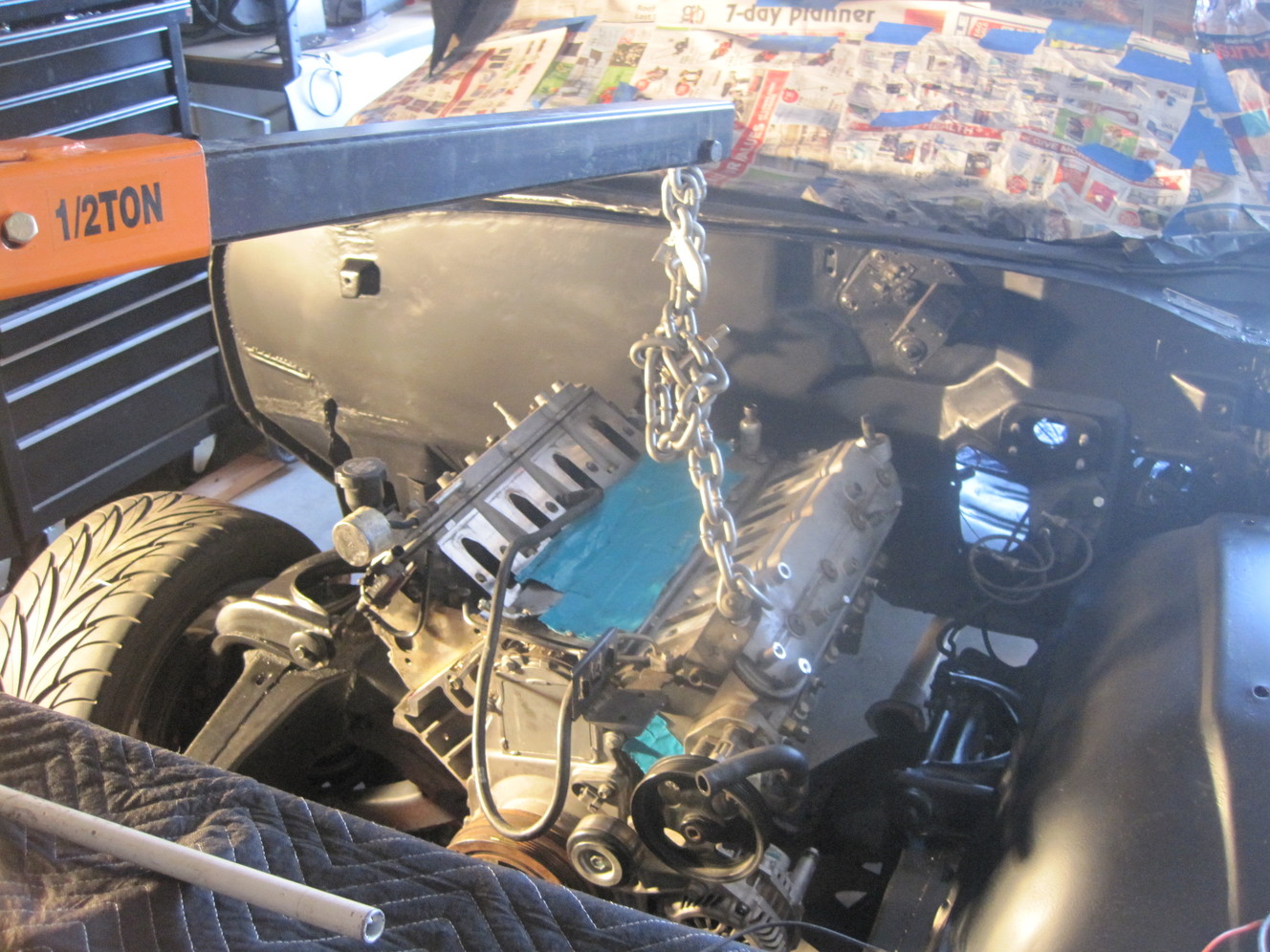 The GTO-sourced LS2 being lowered into the frame rails of LeBlanc's Chevelle. (Photo: Steve LeBlanc)