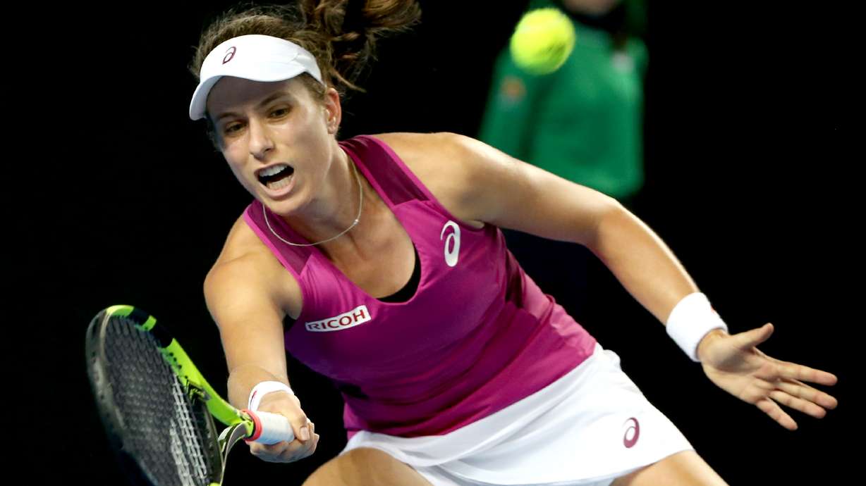 The Latest: Chinese qualifier Zhang reaches 4th round