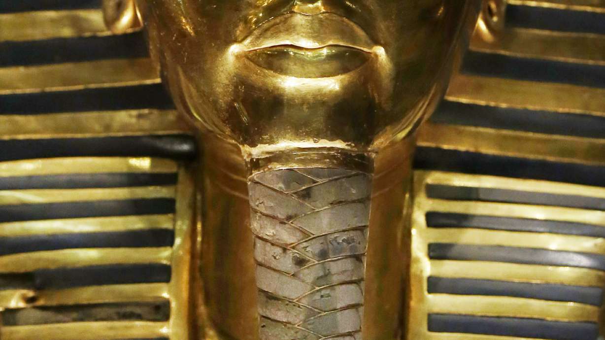 Egypt says King Tut mask was scratched, sends 8 to trial