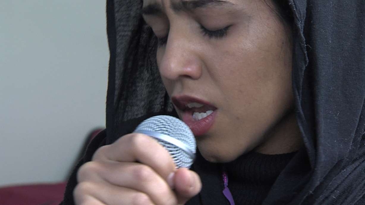 Sonita rapping at Wasatch Academy in Mt. Pleasant. (Photo: Ray Boone, KSL-TV)