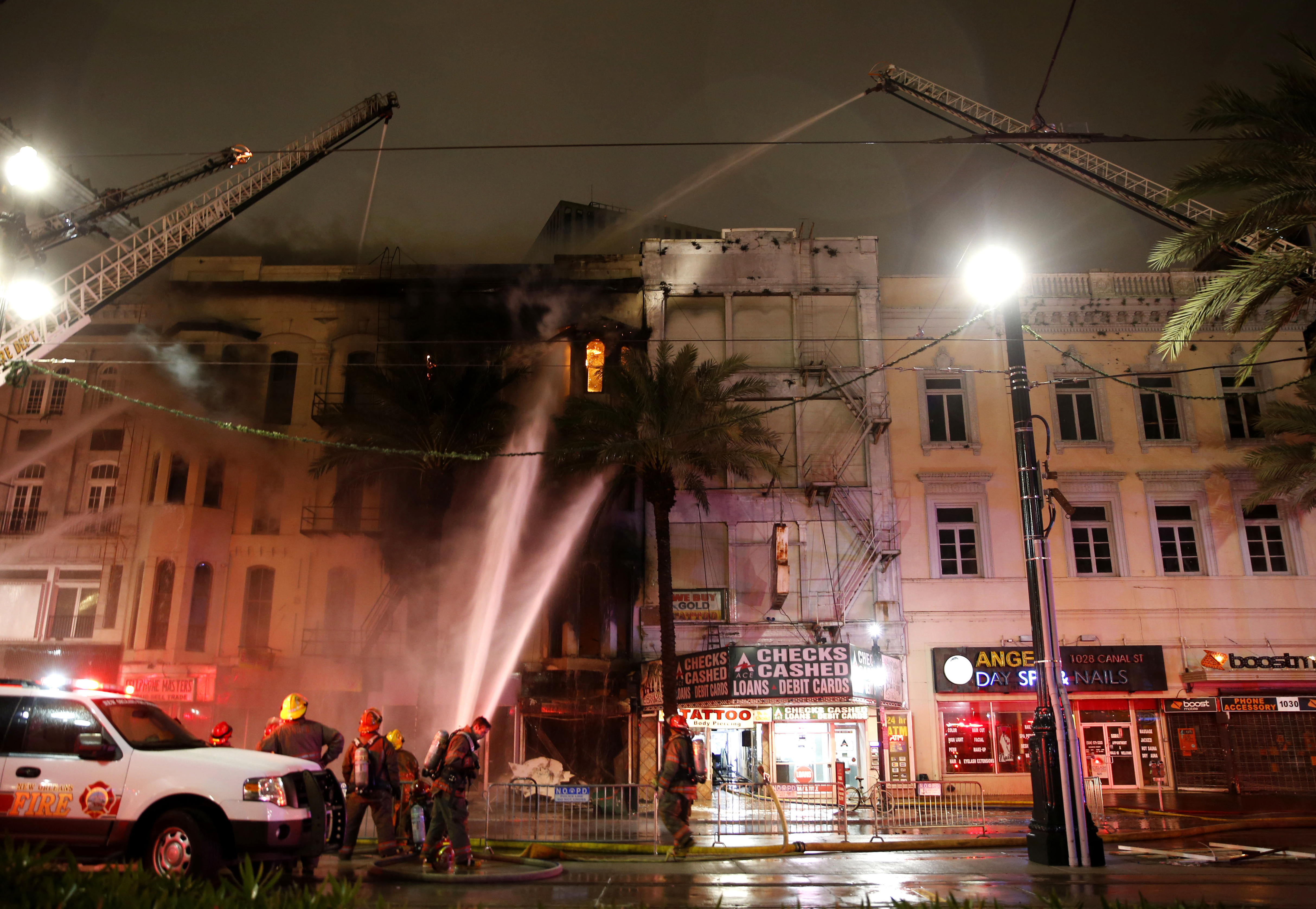 The Latest: Arson not suspected in Canal Street blaze