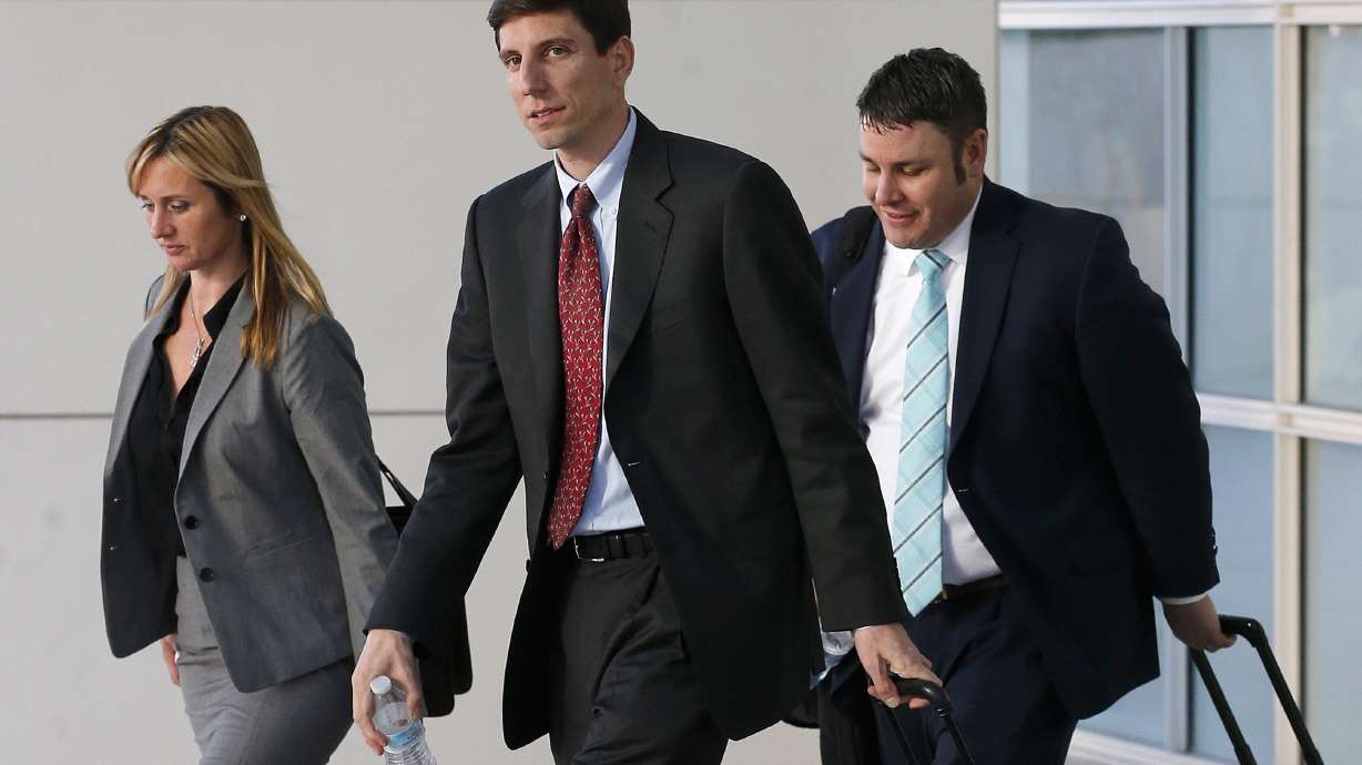 Defense begins case in trial against polygamous towns