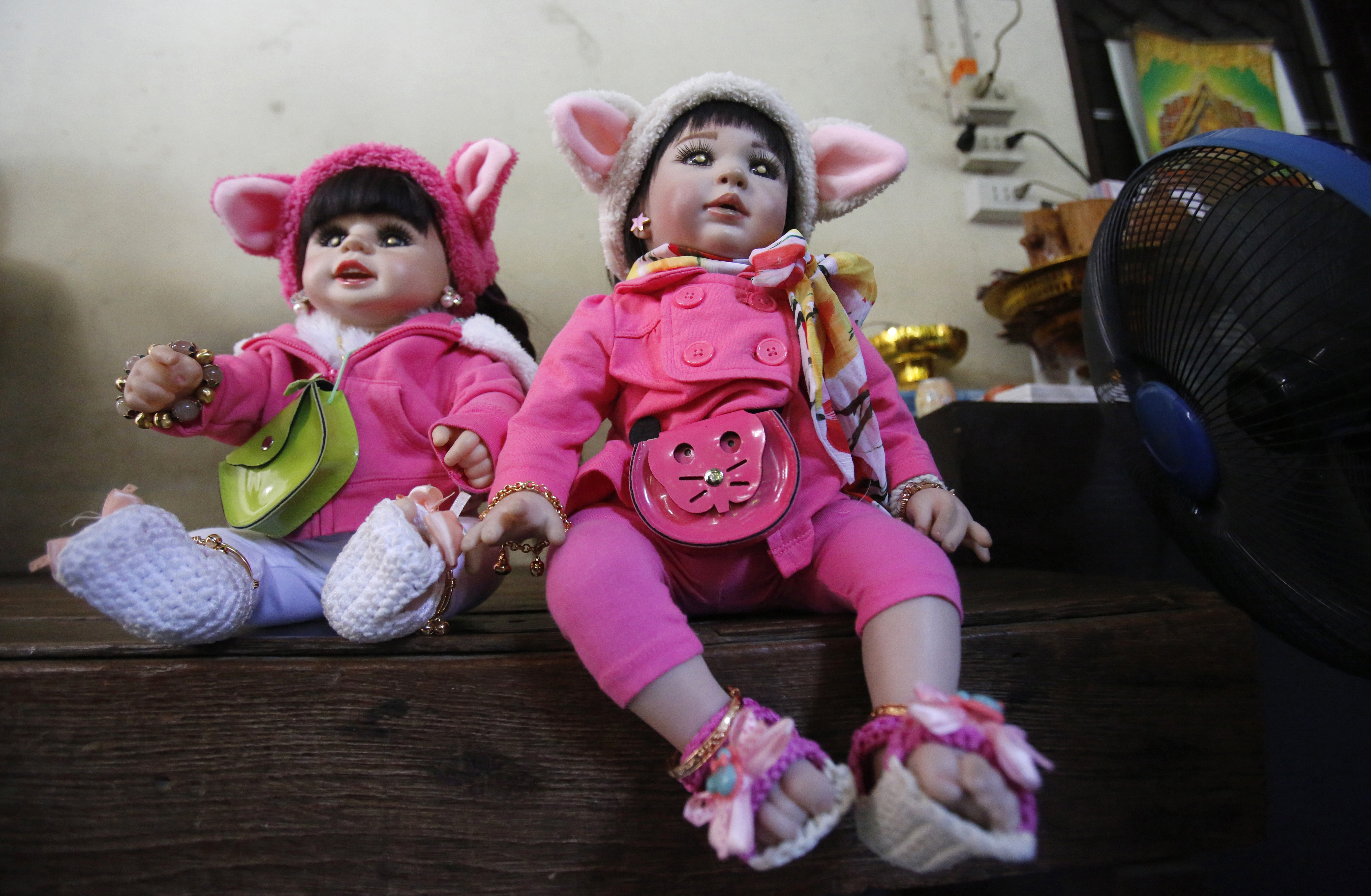 In latest fad, Thais treat 'child angel' dolls like pets