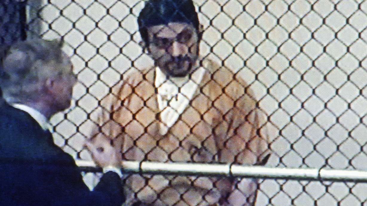 The Latest: Judge delays trial of man who escaped from jail