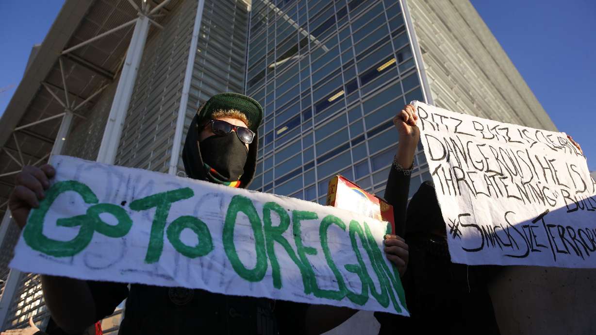 The Latest: Mourners fill pews for Oregon occupier's funeral