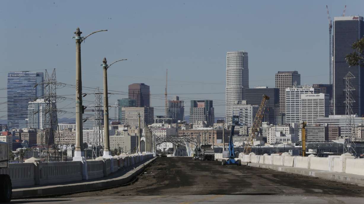 The Latest: Freeway reopens with demolition of LA bridge