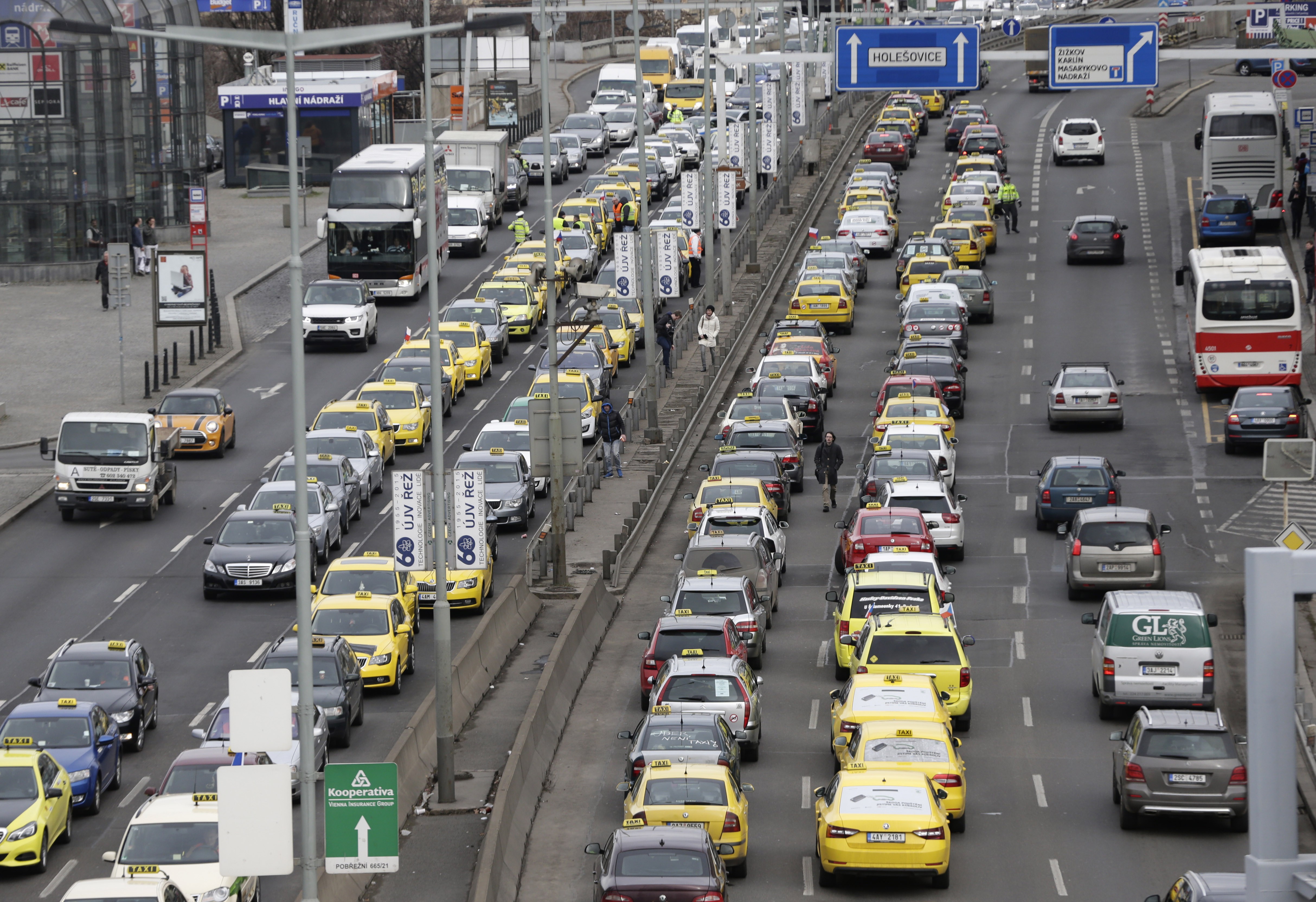 Taxi in Prague block traffic, demand higher pay, ban on Uber
