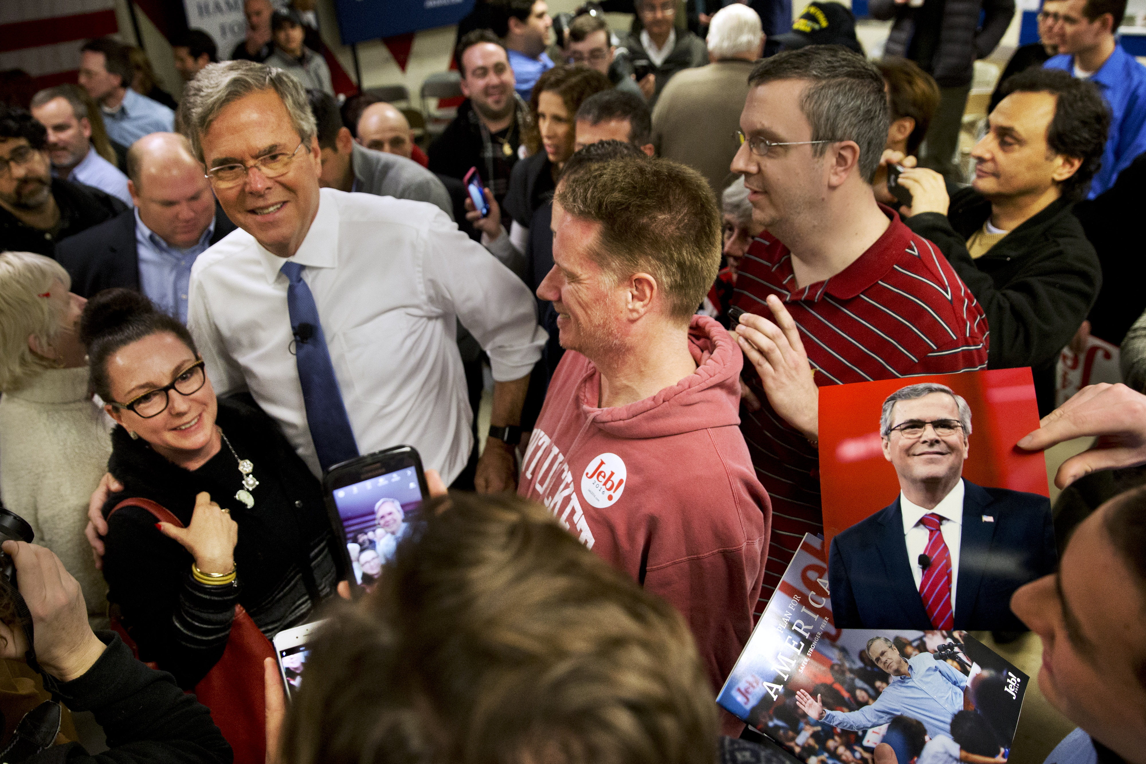 The Latest: Clinton vows to 'make a difference' every day