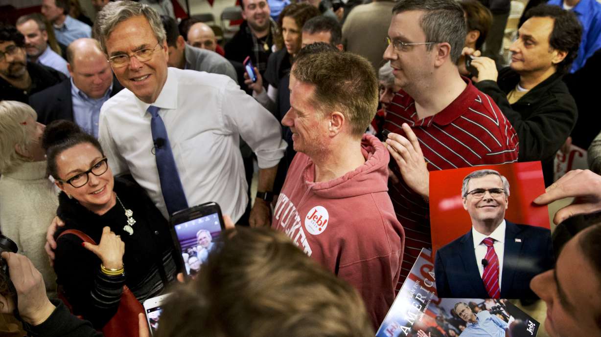 The Latest: Clinton vows to 'make a difference' every day