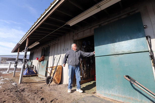 Alberto Gutierrez clean his horse's stall at the Salt Lake County Equestrian Park and Event Center in South Jordan on Monday, Feb. 8, 2016. (Photo: Scott G Winterton, Deseret News)