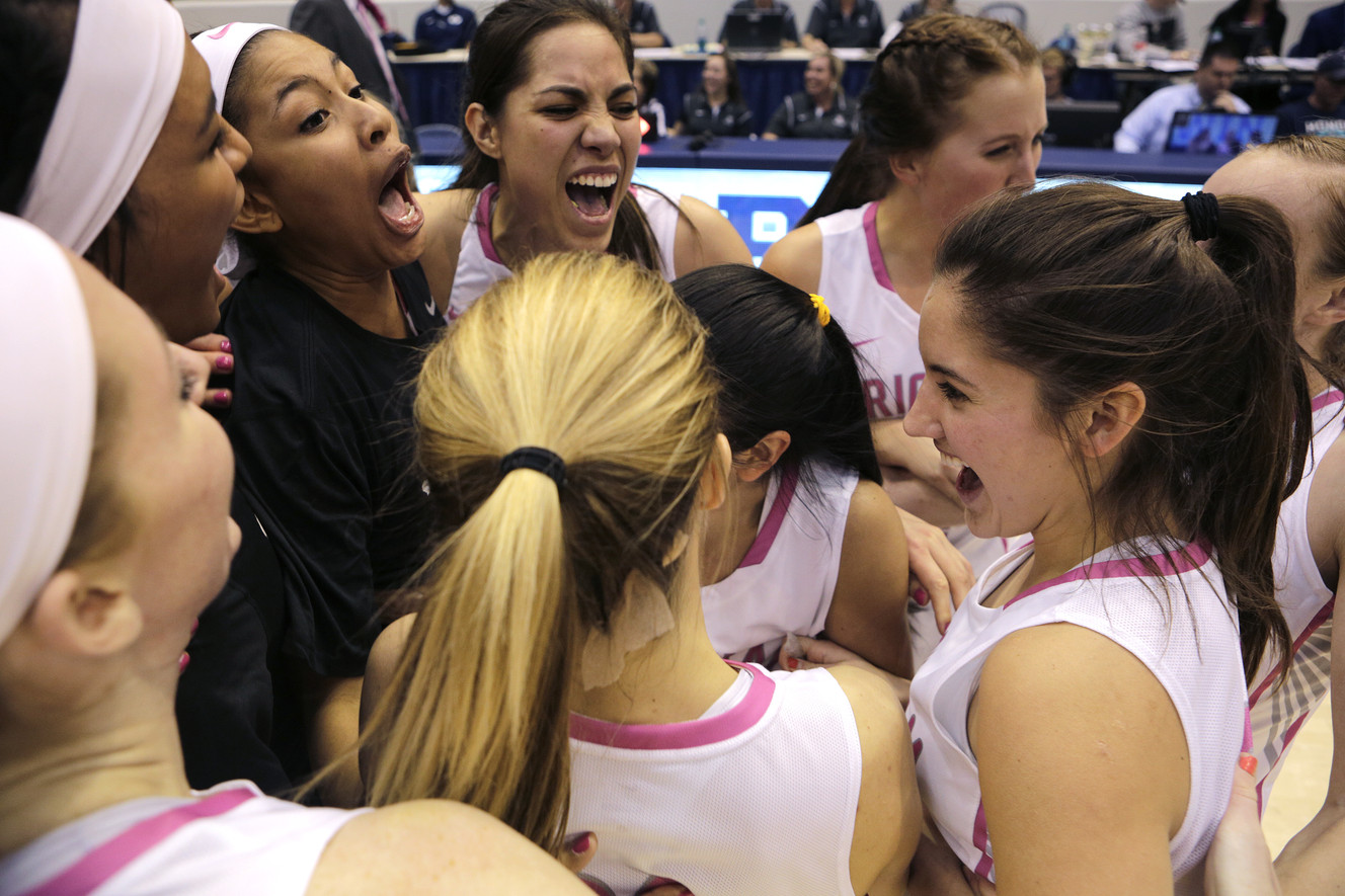The BYU teams celebrates after defeating San Fransisco 65-62 at the Marriott Center in Provo, Jan. 11, 2016. (Photo: Luke Franke, Deseret News)