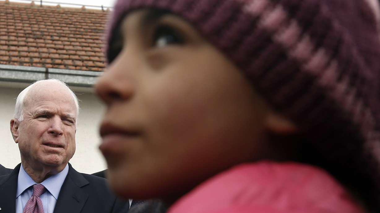 The Latest: Official: Half of Calais camp to be evacuated