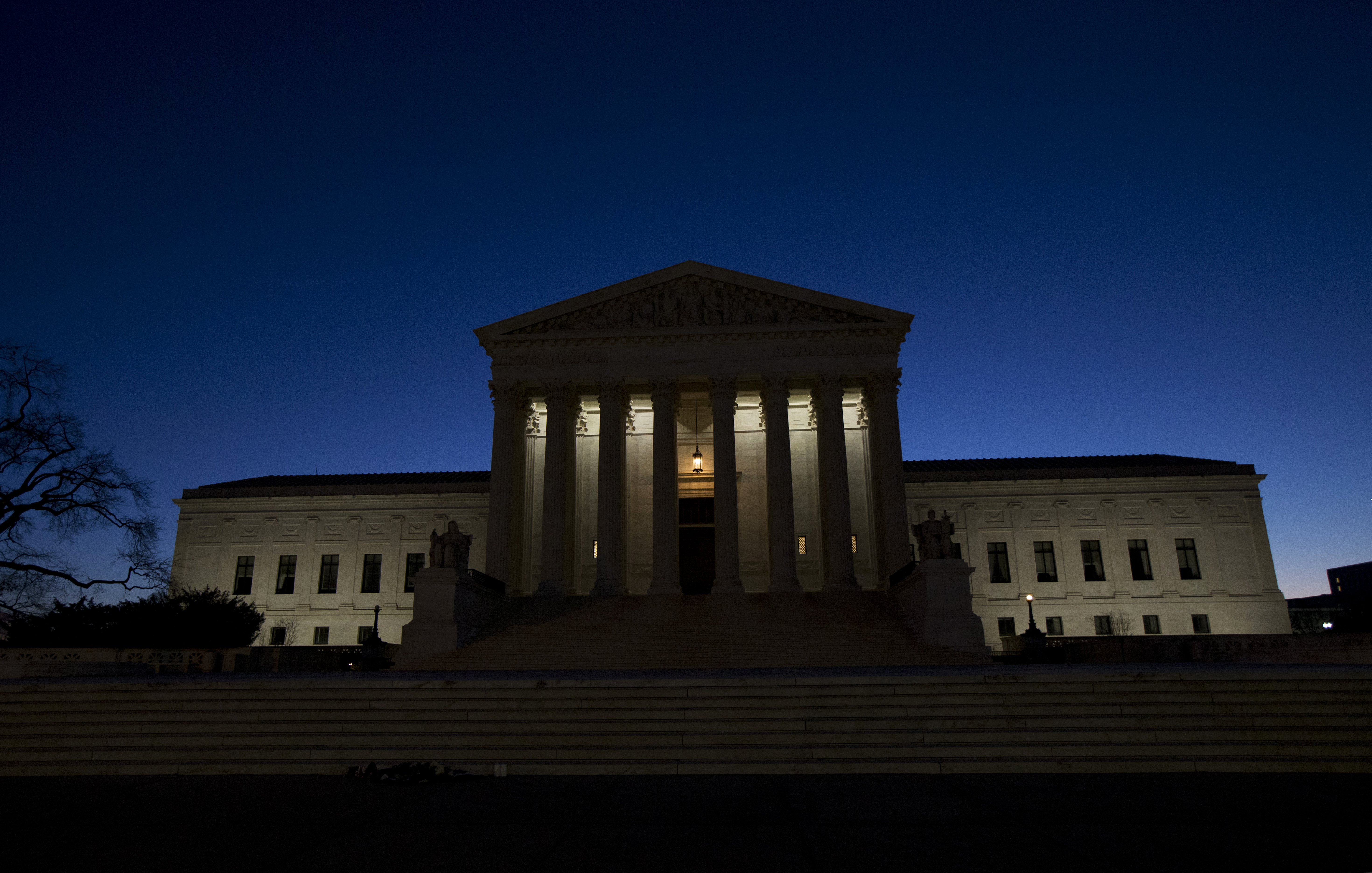 Latest: Airport says plane with Scalia's body has left Texas