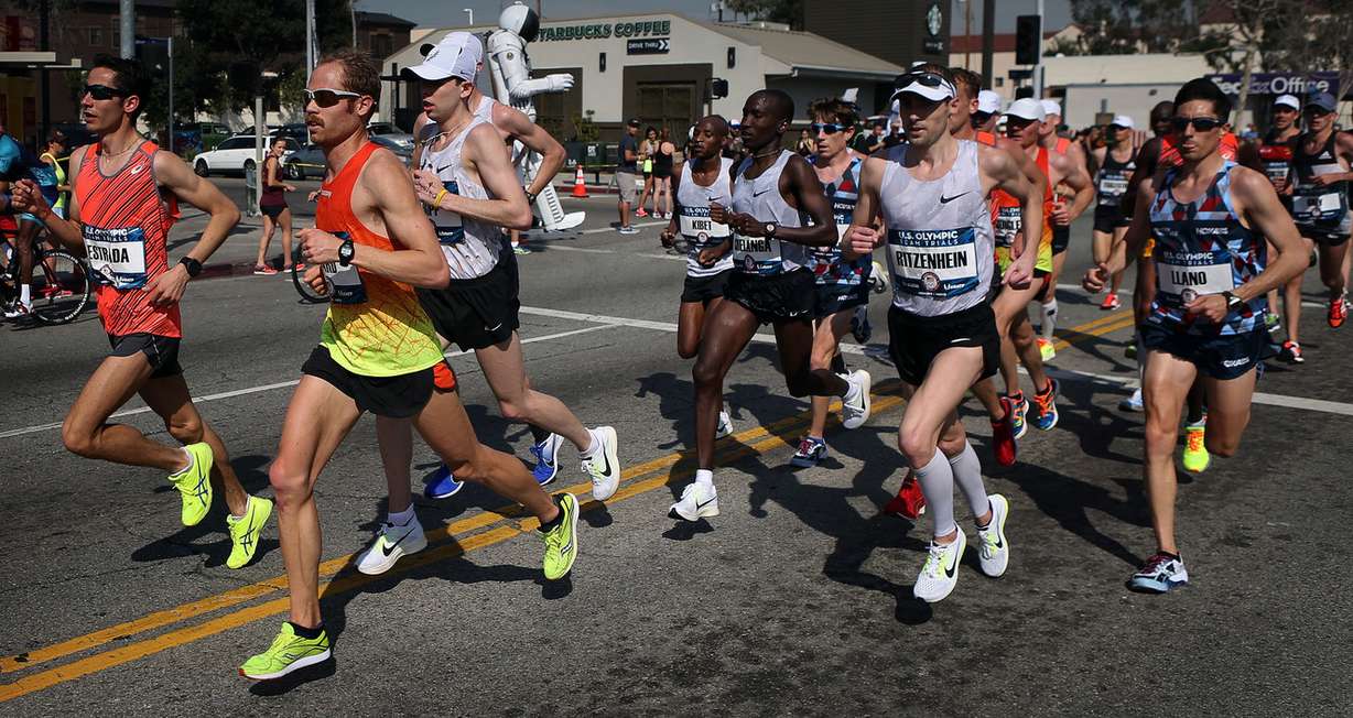 Jared Ward, second from left, of Provo runs ahead of the pack during the U.S. Olympic Marathon Trials in Los Angeles Ca., Saturday, February 13, 2016. Ward took third overall, earning him a spot on the U.S. Olympic team. (Photo: Brian Nicholson)