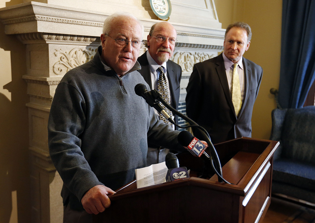 Former University of Utah football coach Ron McBride discusses is support for SB73, which would legalize medical cannabis in Utah, during a press conference at the Capitol in Salt Lake City on Wednesday, Feb. 17, 2016. Behind McBride are Dr. LeGrand Belnap and Sen. Mark Madsen, R-Saratoga Springs, the sponsor of the bill. (Photo: Ravell Call, Deseret News)