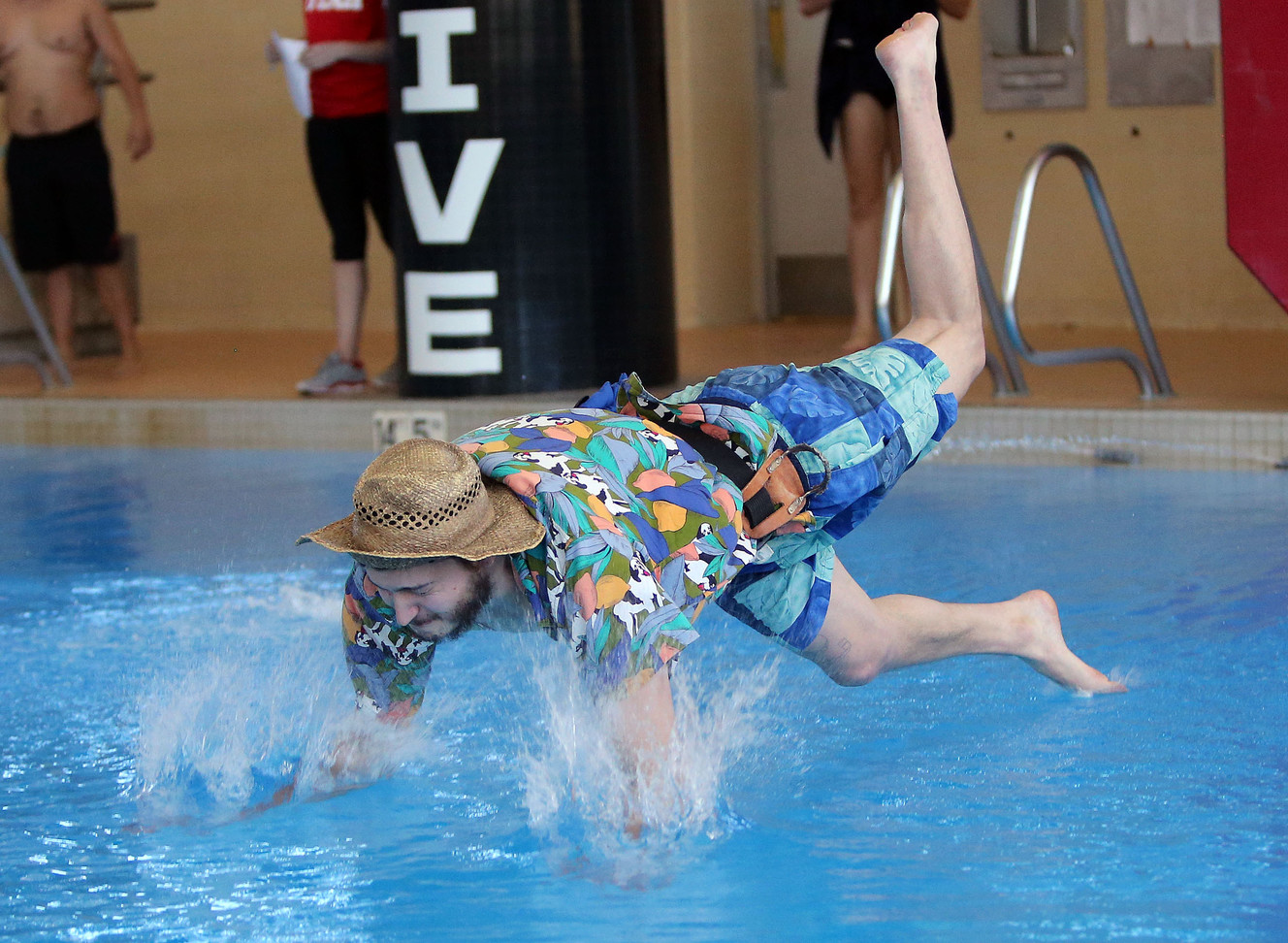 Photos: Divers make a splash at belly flop contest