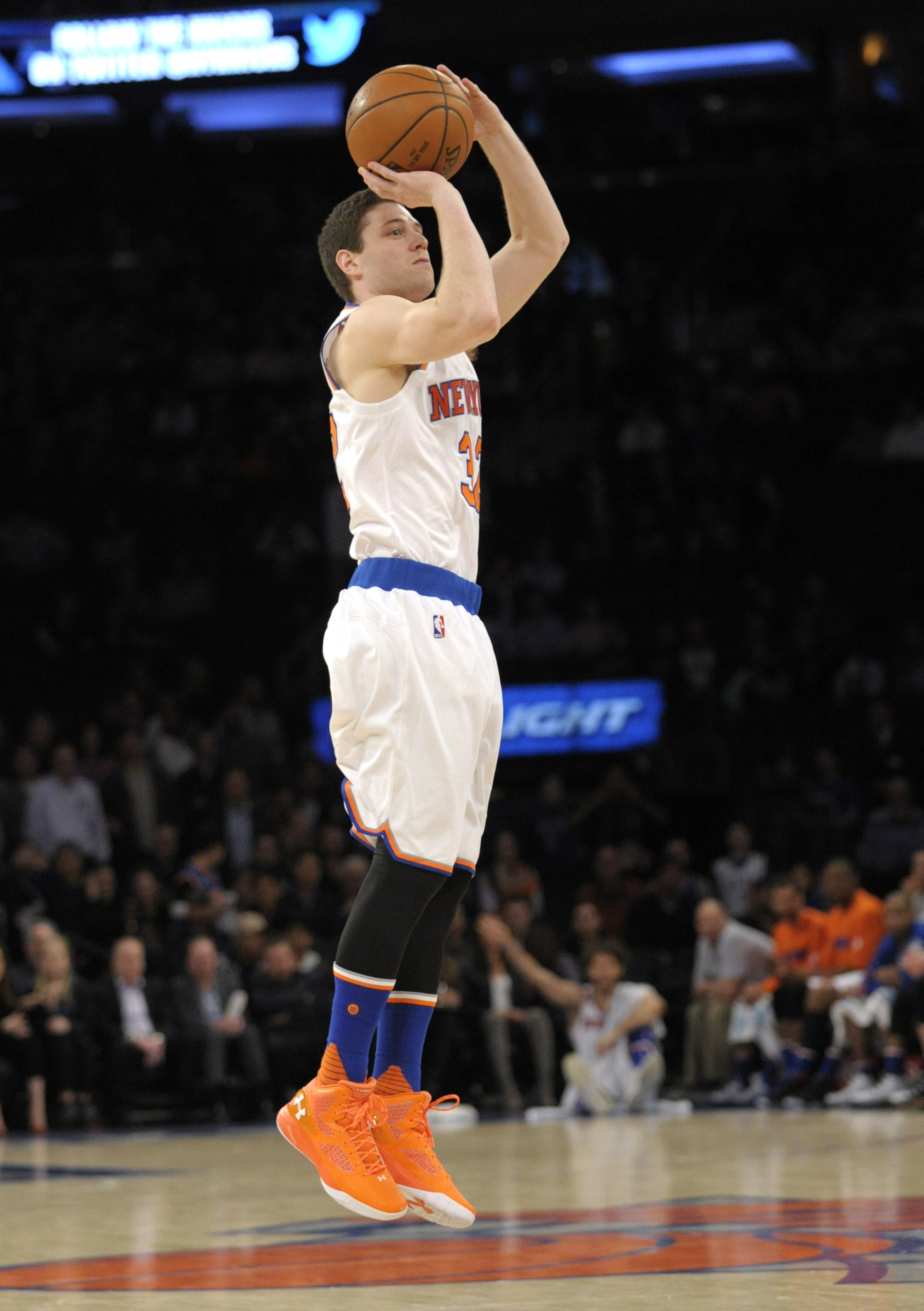 New York Knicks guard Jimmer Fredette hits a three-point shot during the fourth quarter of an NBA basketball game against the Toronto Raptors Monday, Feb. 22, 2016, at Madison Square Garden in New York. The Raptors won 122-95. (AP Photo/Bill Kostroun)