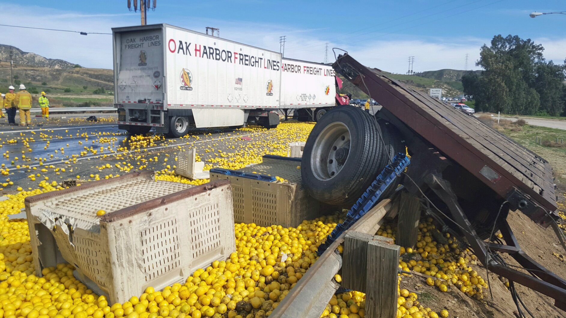 2 killed in crash involving big rig that spilled lemons