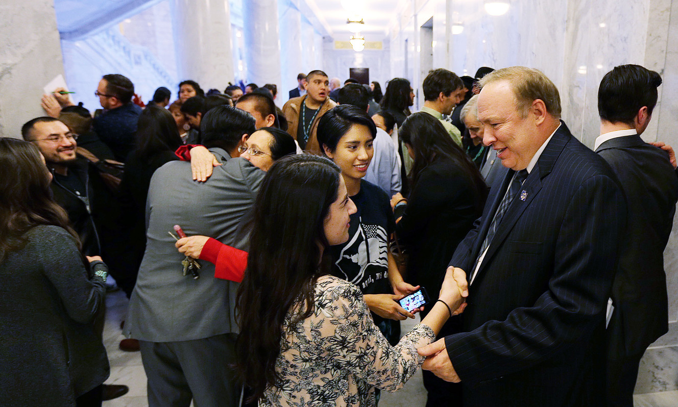 Ashley Madrigal, front, and Eva Lopez greet Sen. Jim Dabakis, D-Salt Lake City, after SB170, which would change the name of Columbus Day to Indigenous Peoples Day in Utah, is passed from committee to the full Senate at the Capitol in Salt Lake City on Wednesday, Feb. 24, 2016. (Photo: Ravell Call/Deseret News)