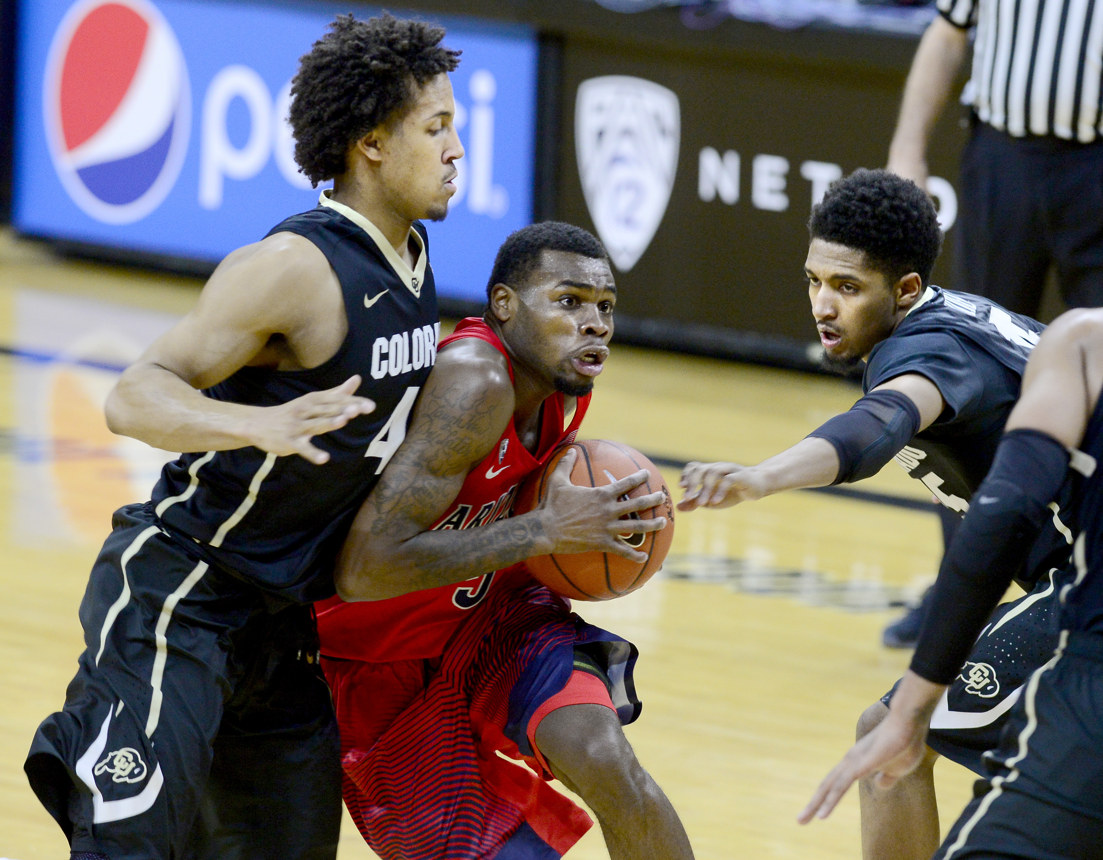 Colorado ends skid vs ninth-ranked Arizona, 75-72