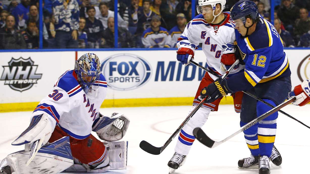 Lundqvist has milestone night as Rangers beat Blues 2-1