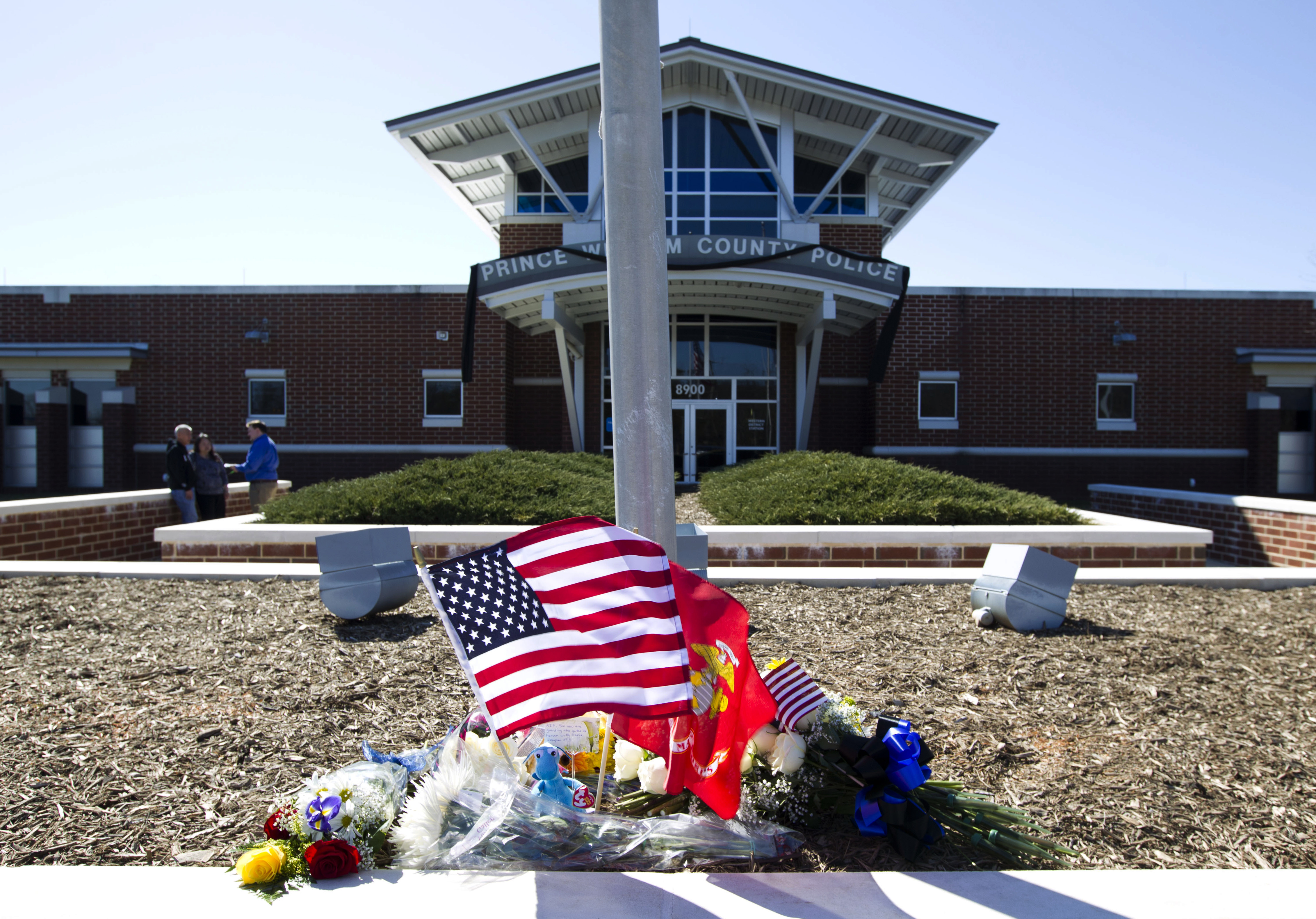 The Latest: Sister of slain mother: Son heard gunshots