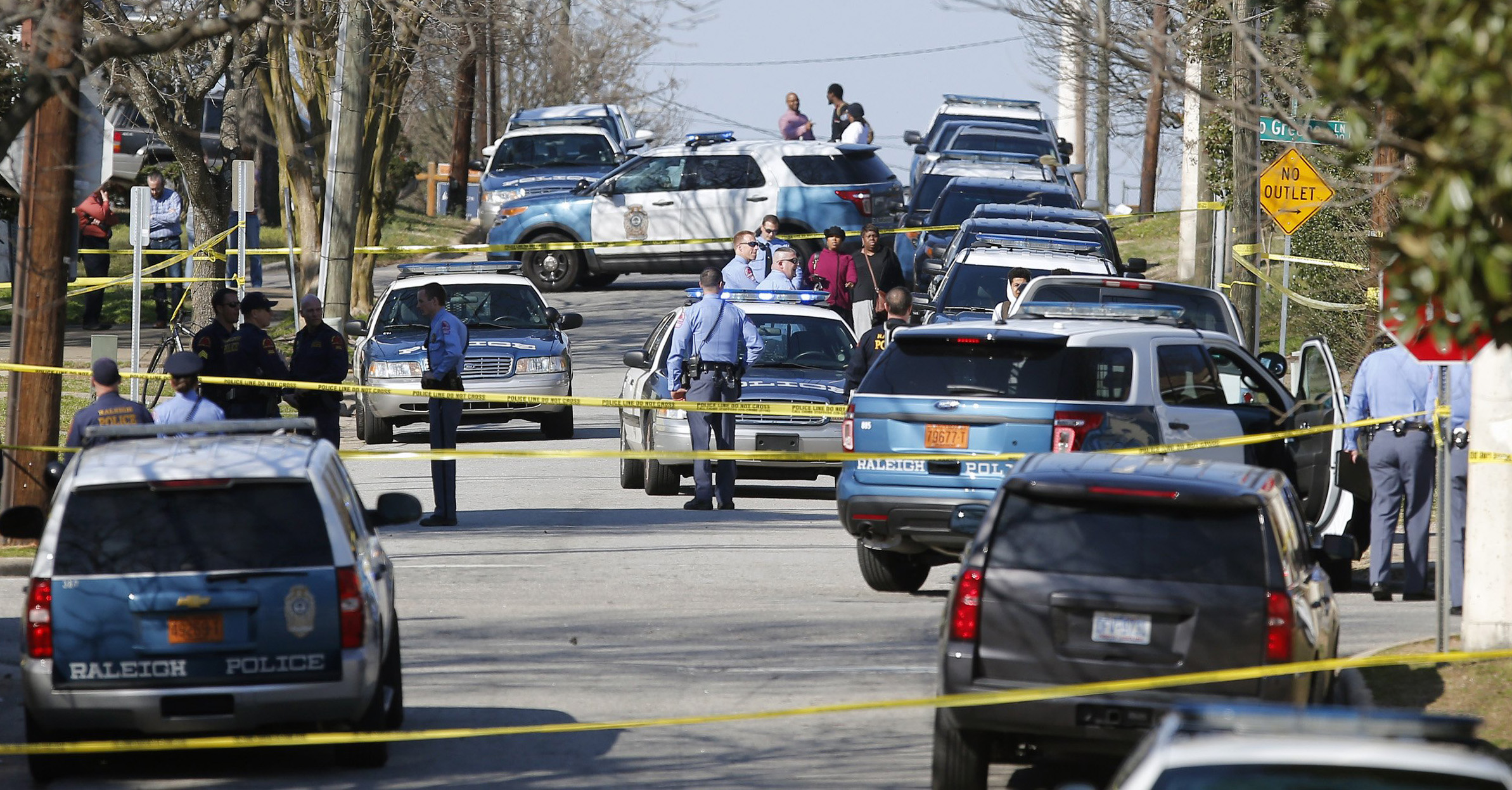 The Latest: Police identify officer who chased, shot man