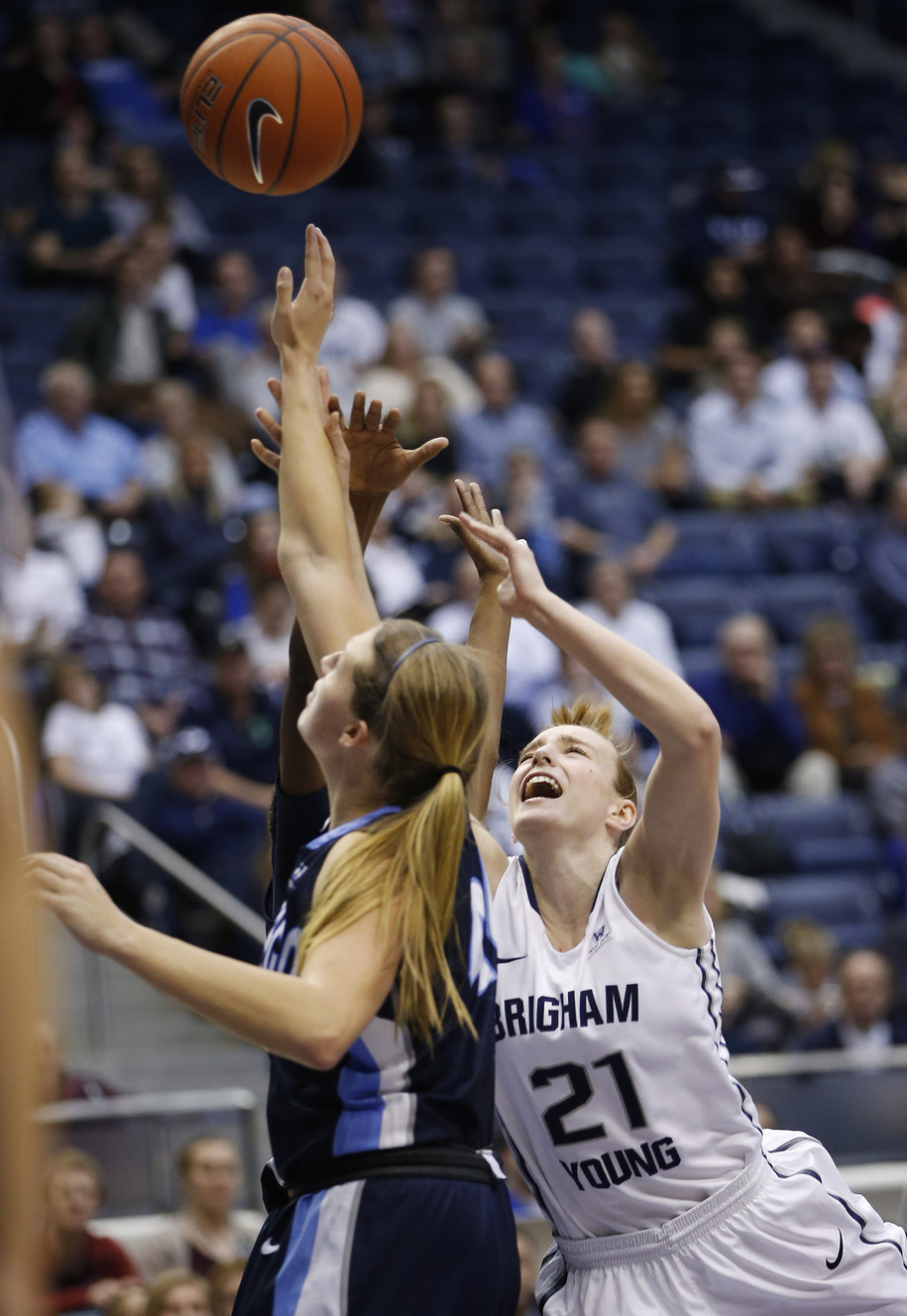 BYU guard Lexi Eaton Rydalch (21) scores over San Diego forward Sydney Williams (44) in Provo, Feb. 18, 2016. BYU opens the West Coast Conference Tournament as the top seed Friday. (Photo: Jeffrey D. Allred, Deseret News)